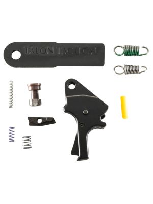 Flat black anodized trigger, five springs, two small steel parts, a yellow slave pin, and Apex sight tool